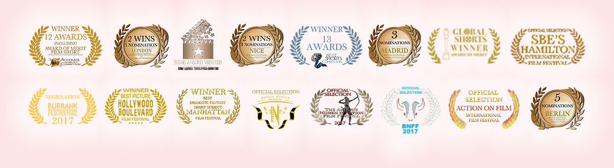A bunch of awards that are on top of each other